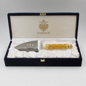 New in box Faberge Coronation wedding cake slicer